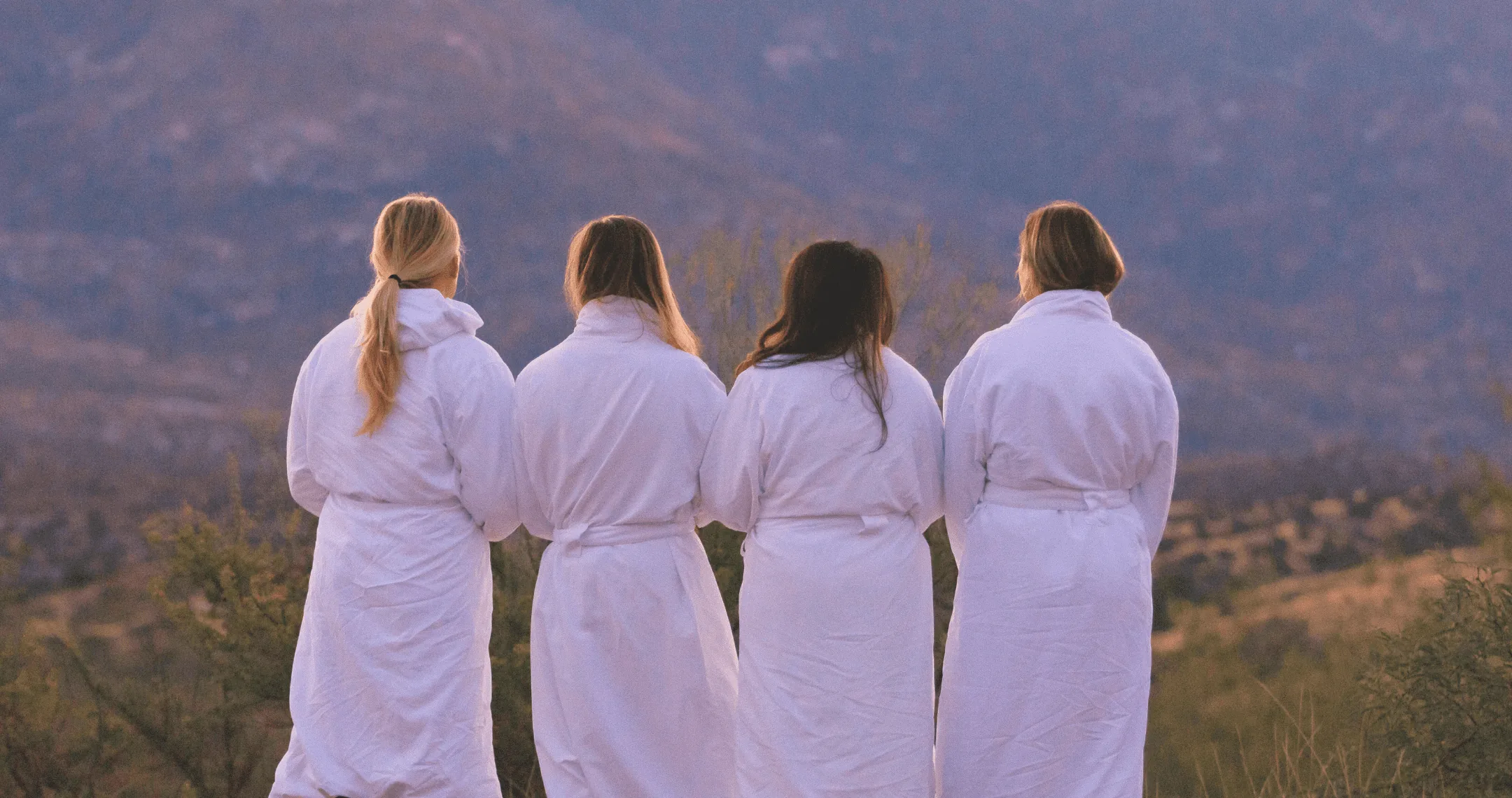 a group of women supporting each other and connecting in a peaceful environment at the wellness retreat, sharing moments of empowerment