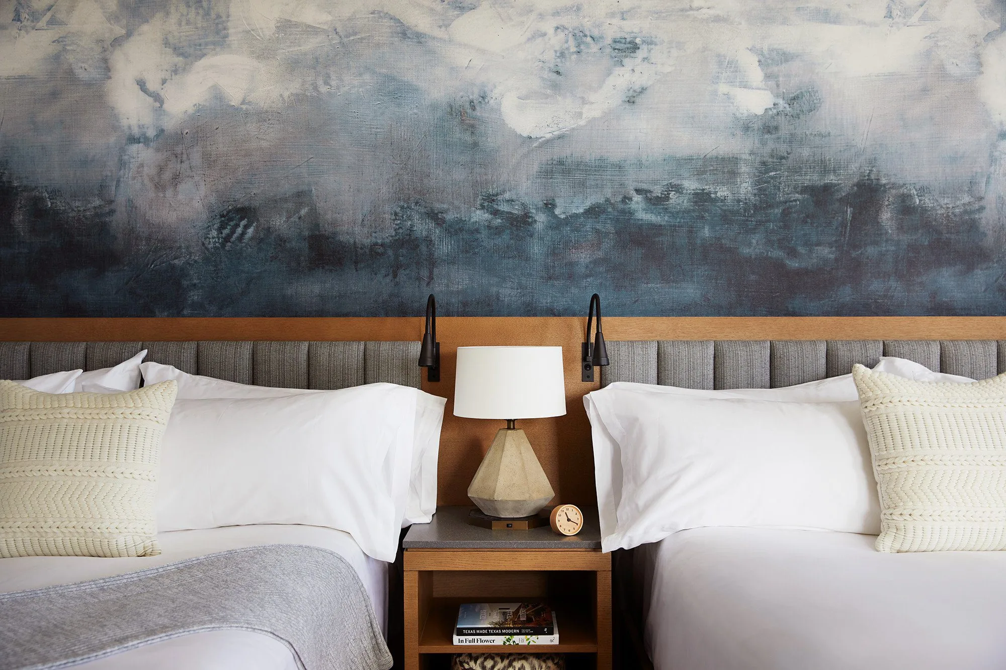 two beds separated by a side table