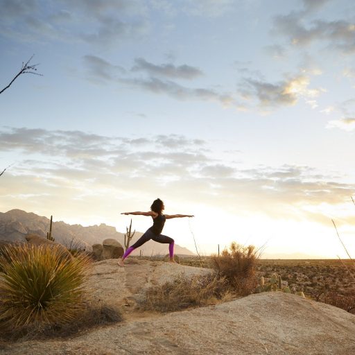 person doing yoga pose outside
