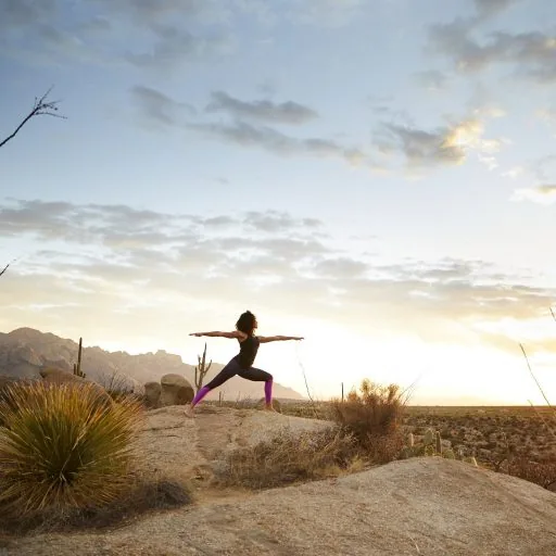 person doing yoga pose outside