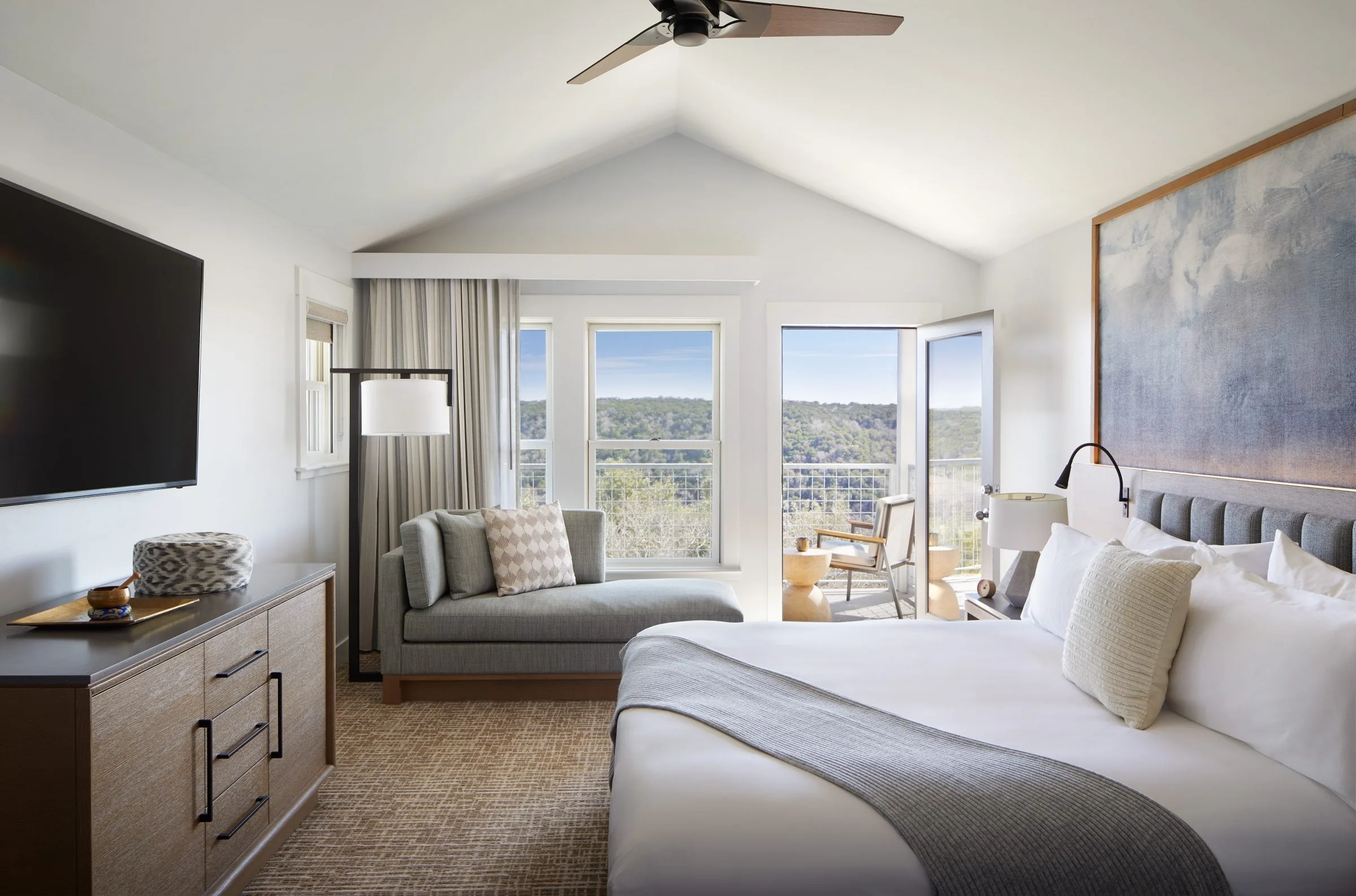 single room with patio and landscape view
