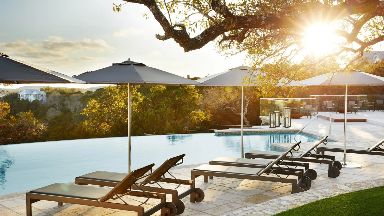 lounge chairs beside pool
