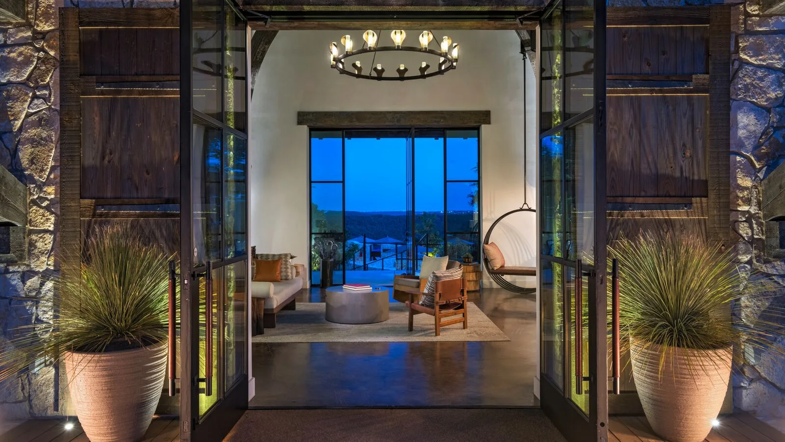 view of living area from open window