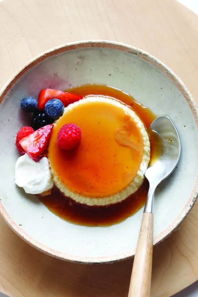 vanilla bean flan topped with fruits