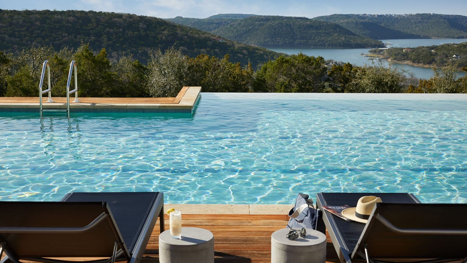 lounge chairs beside pool