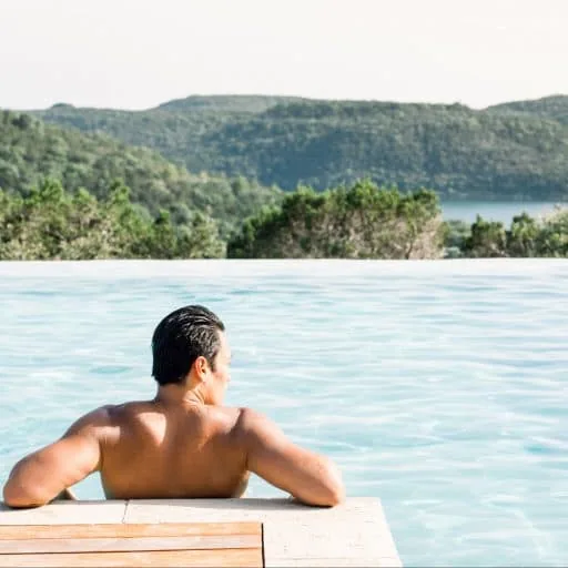 person relaxing in a pool