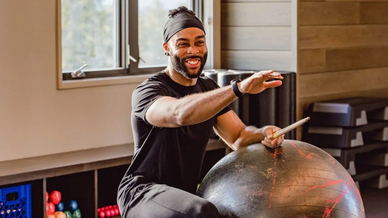 person stretching with a yoga ball