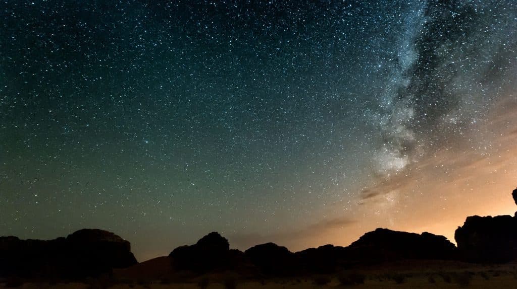 Desert sky with stars during sunset