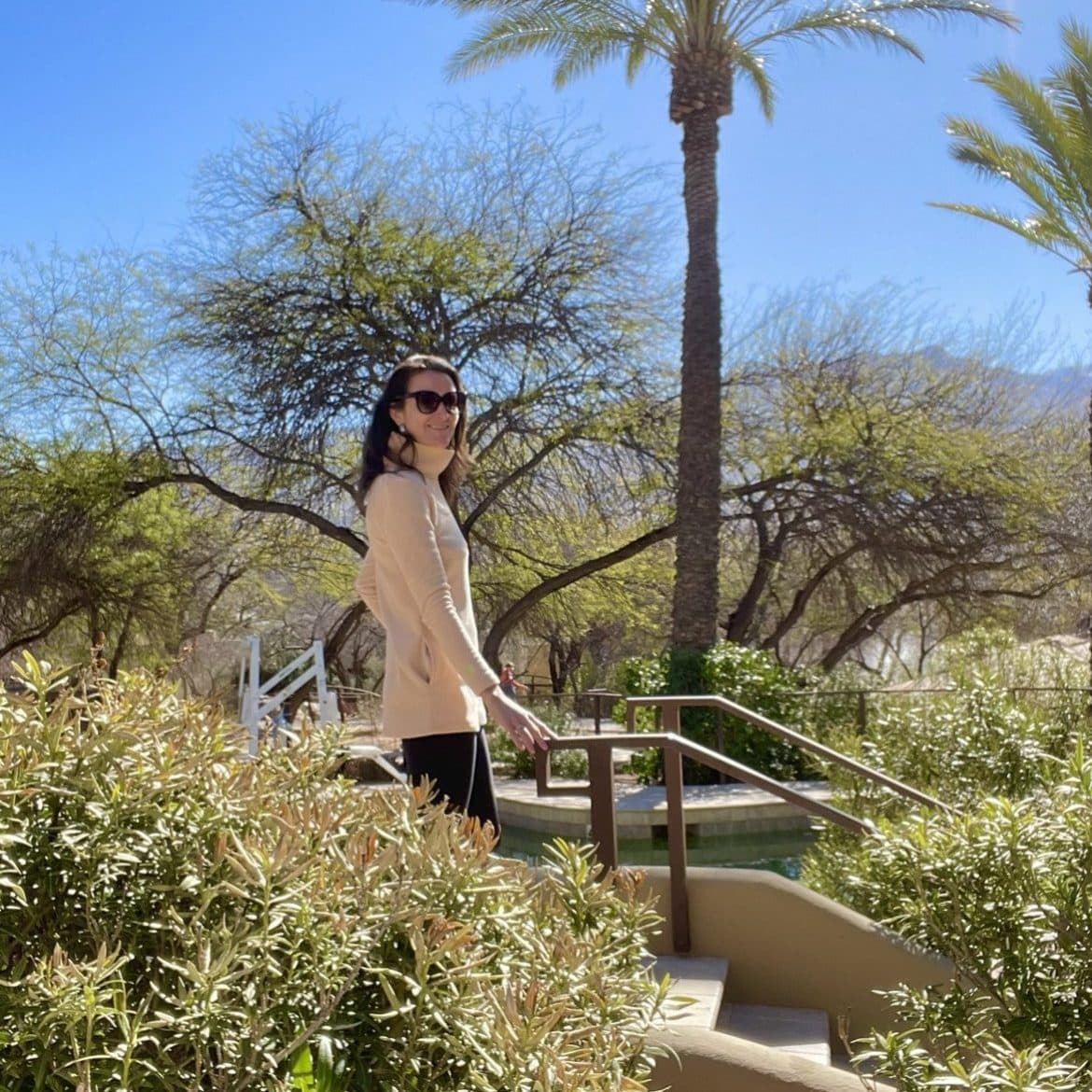 Lydia Fenet outside in resort garden